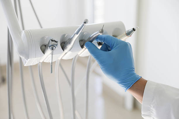 Professional Tooth Extraction technician working in Royal Pines, NC